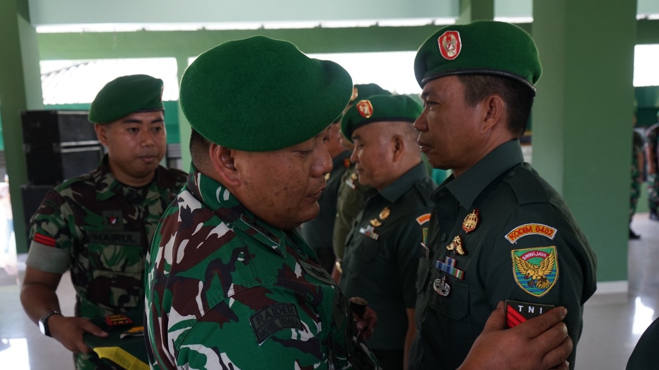 Kodim 0402/OKI Gelar Tradisi Korps Raport Kenaikan Pangkat 63 Prajurit