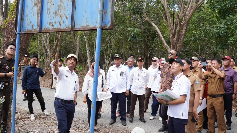 Sidang Lapangan : Pengadilan Negeri Kayuagung Tinjau Lokasi Sengketa Hutan Kota