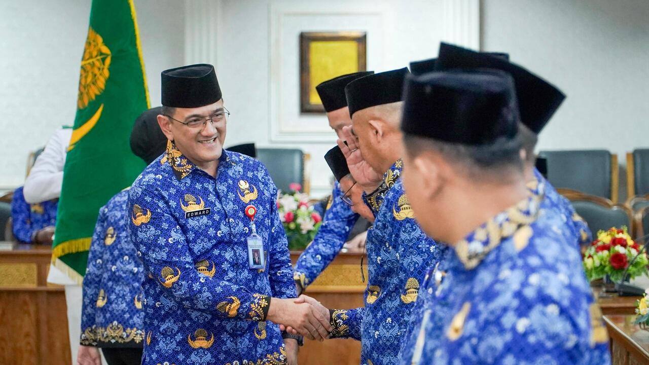 Sekda Sumsel Edward Candra Kukuhkan PAW Dewan Pengurus Korpri Kota Palembang