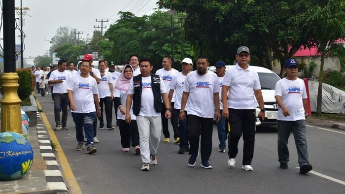 KORPRI Kabupaten OKI Rayakan HUT ke-52 dengan Jalan Sehat dan Aksi Sosial 