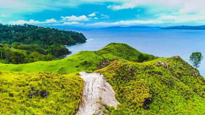 Keindahan Pantai Pulisan di Sulawesi Utara yang Memikat