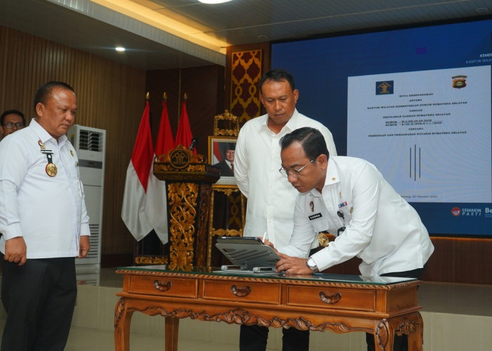 Kanwil Kemenkum Sumsel dan Polda Sumsel Tandatangani Nota Kesepahaman untuk Perkuat Pengawasan Profesi Notaris