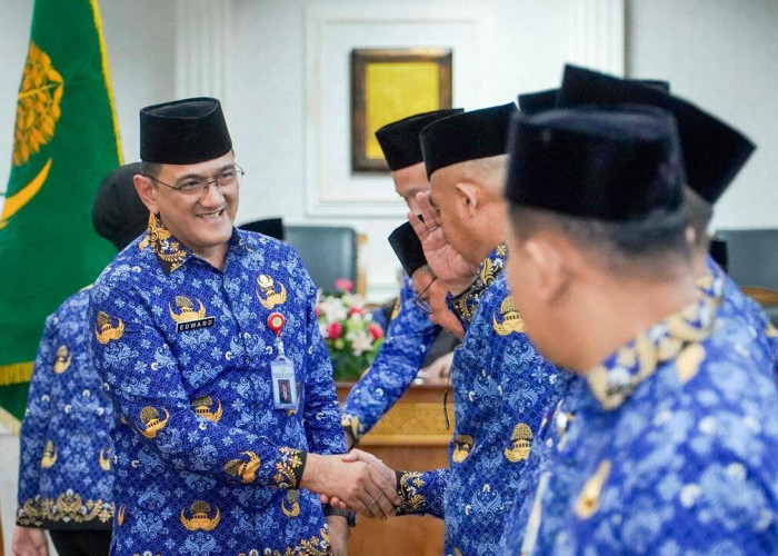 Sekda Sumsel Edward Candra Kukuhkan PAW Dewan Pengurus Korpri Kota Palembang