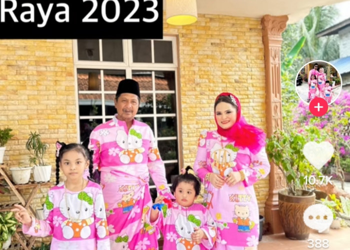 Bikin Gemas, Suami Ini Rela Ikuti Istri Pakai Baju Lebaran Hello Kitty