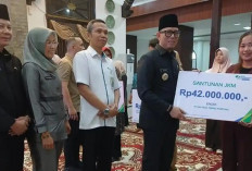 Belasan Ahli Waris Perangkat Desa di OKU Terima Santunan Kematian dari BPJS Ketenagakerjaan
