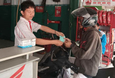 AHASS Sumsel Bagikan Masker Gratis di Tengah Kabut Asap